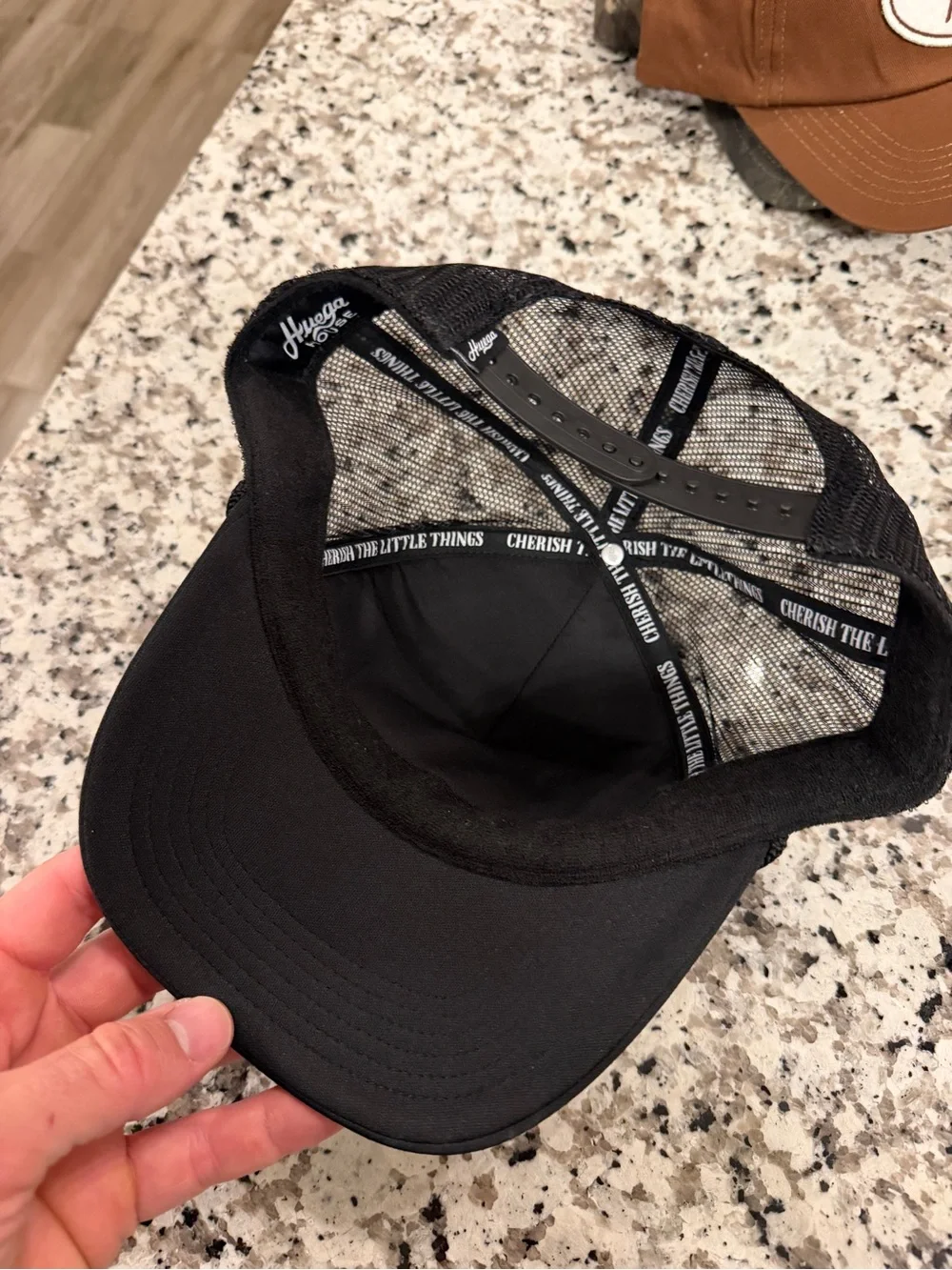 Huega House Black Trucker Cap with White Patch and Stitch Detail